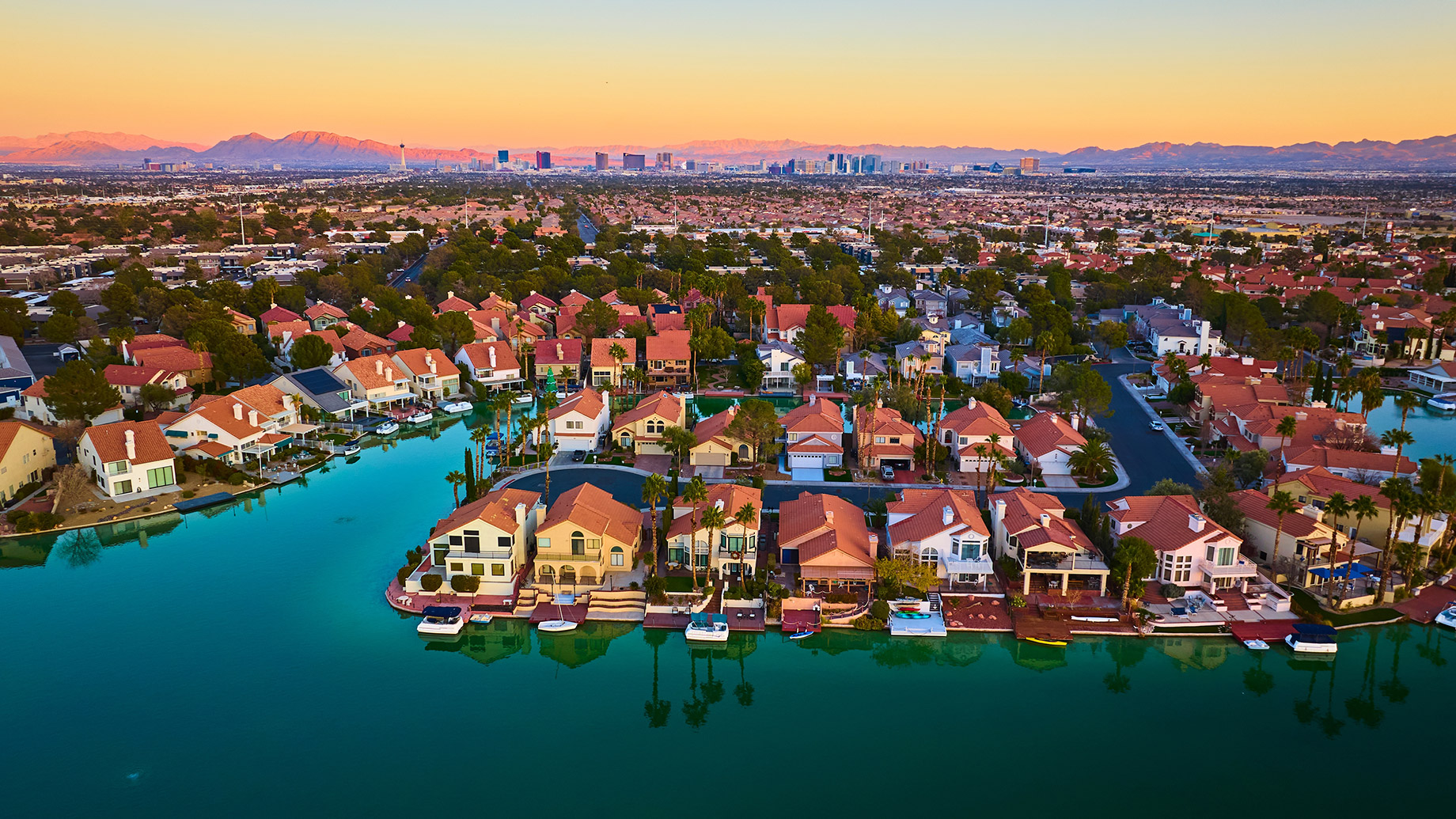 Waterfront Suburb with Las Vegas Skyline at Sunset