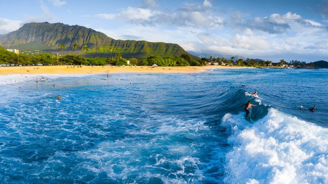 Surfers Riding Waves at Makaha on O'ahu, Hawaii, USA