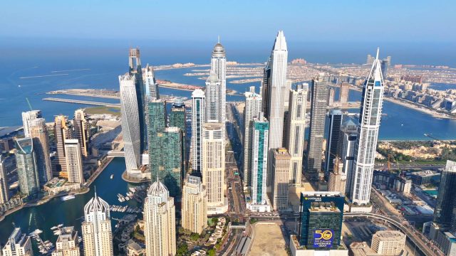 An aerial view of Dubai Marina, an affluent residential neighbourhood known for The Beach at JBR.