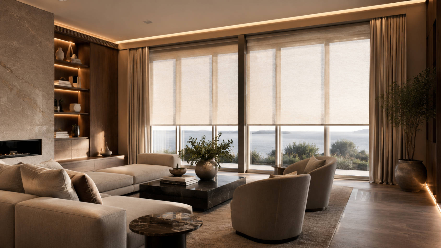 Custom roller shades and floor-to-ceiling curtains fitted across expansive windows in a contemporary luxury living room.