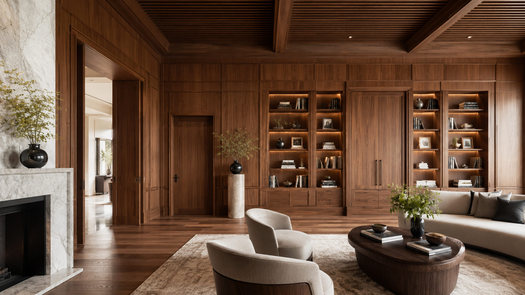 Luxury living room with custom walnut wall panelling, integrated bookshelves, concealed cabinetry, architectural doors, and a slatted coffered ceiling.