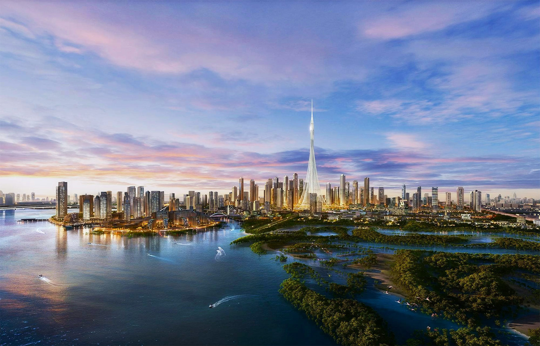 Dubai Creek Harbour skyline at sunset with modern residential towers, waterfront promenades, and Dubai Creek in the foreground.