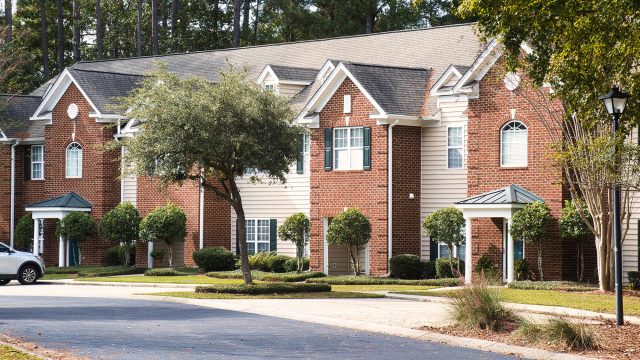 Newly constructed homes along a quiet suburban street in Mount Pleasant, South Carolina.