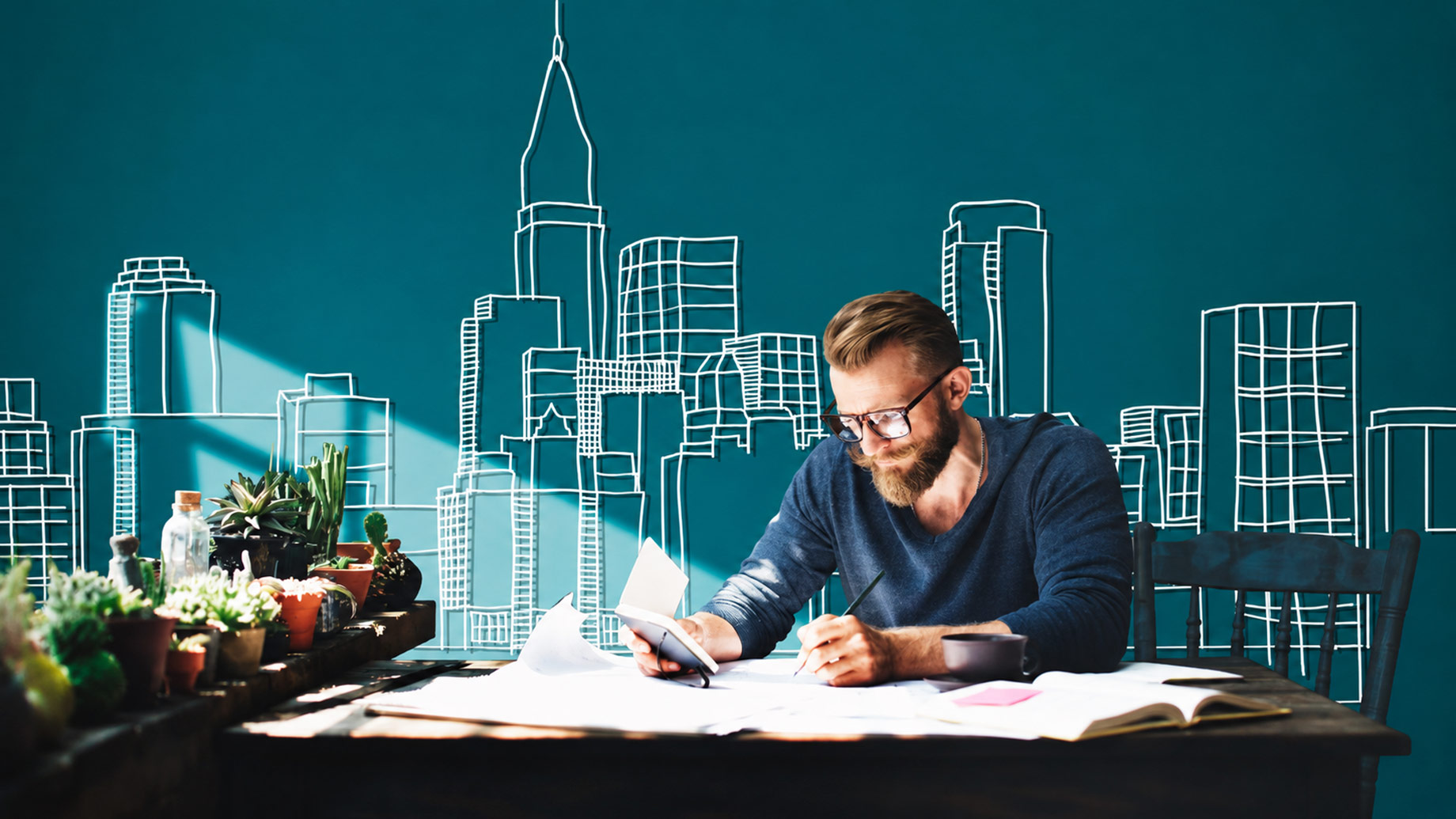 Property investor reviewing calculations and documents at a desk against a stylised city skyline.