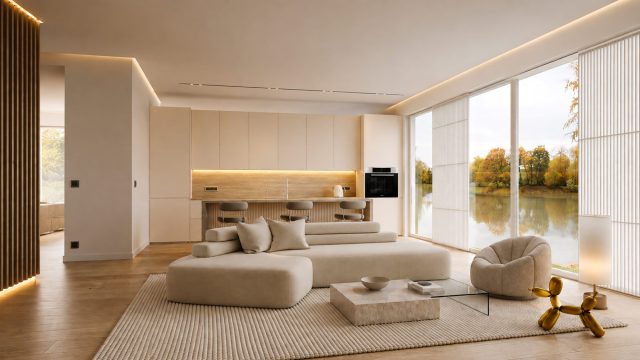Warm open-plan living room and kitchen with sculptural furniture, concealed lighting, and floor-to-ceiling windows overlooking a calm lake.